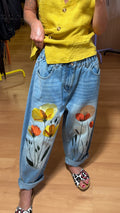 Pantalón vaquero flores bordadas