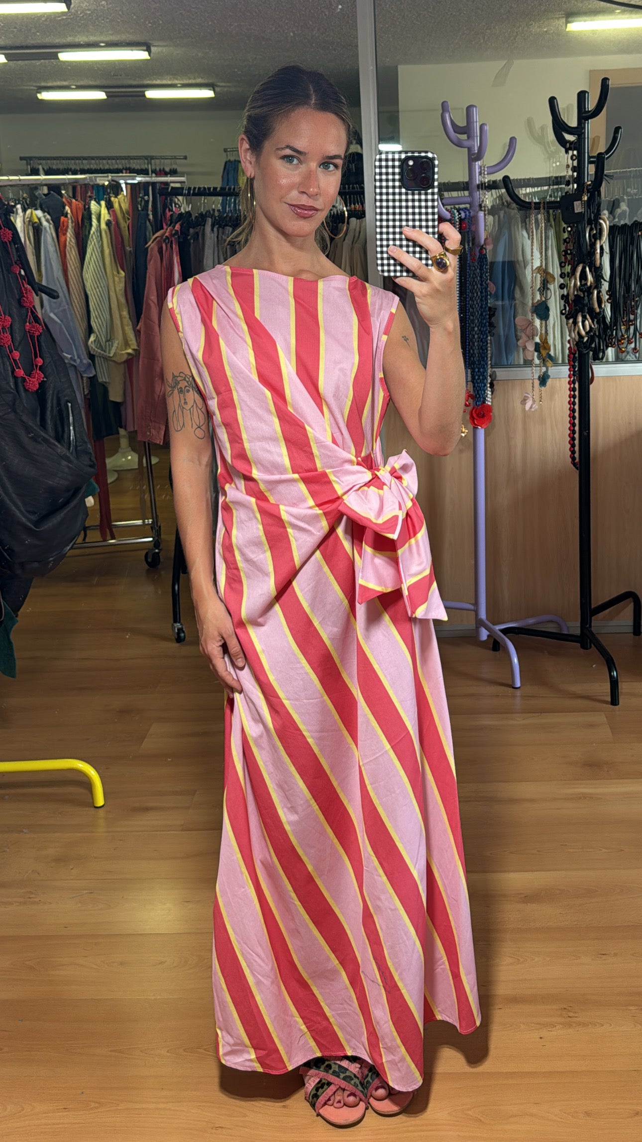 Vestido rayas y lazada lateral