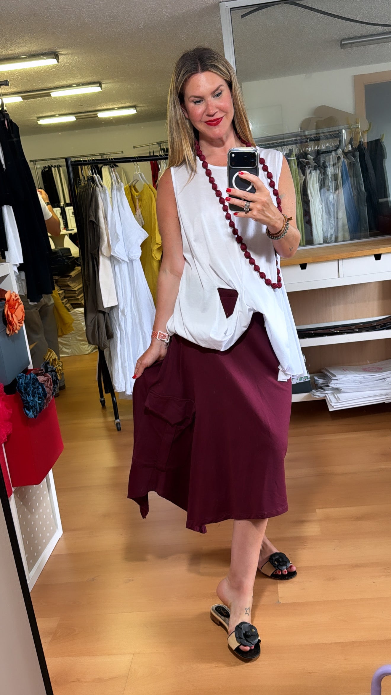 Falda bolsillo plastón