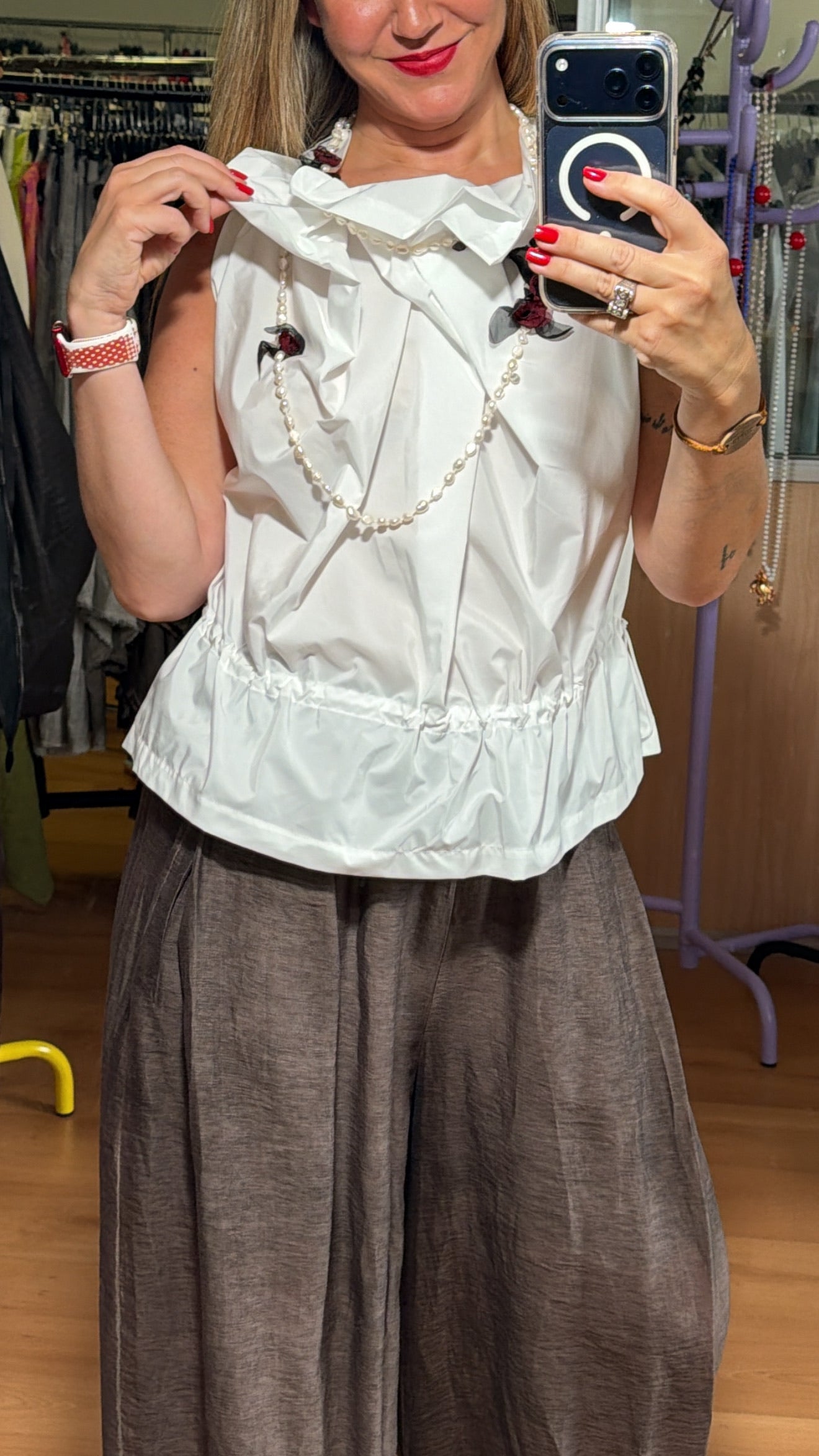 Blusa cuello arlequín sin mangas