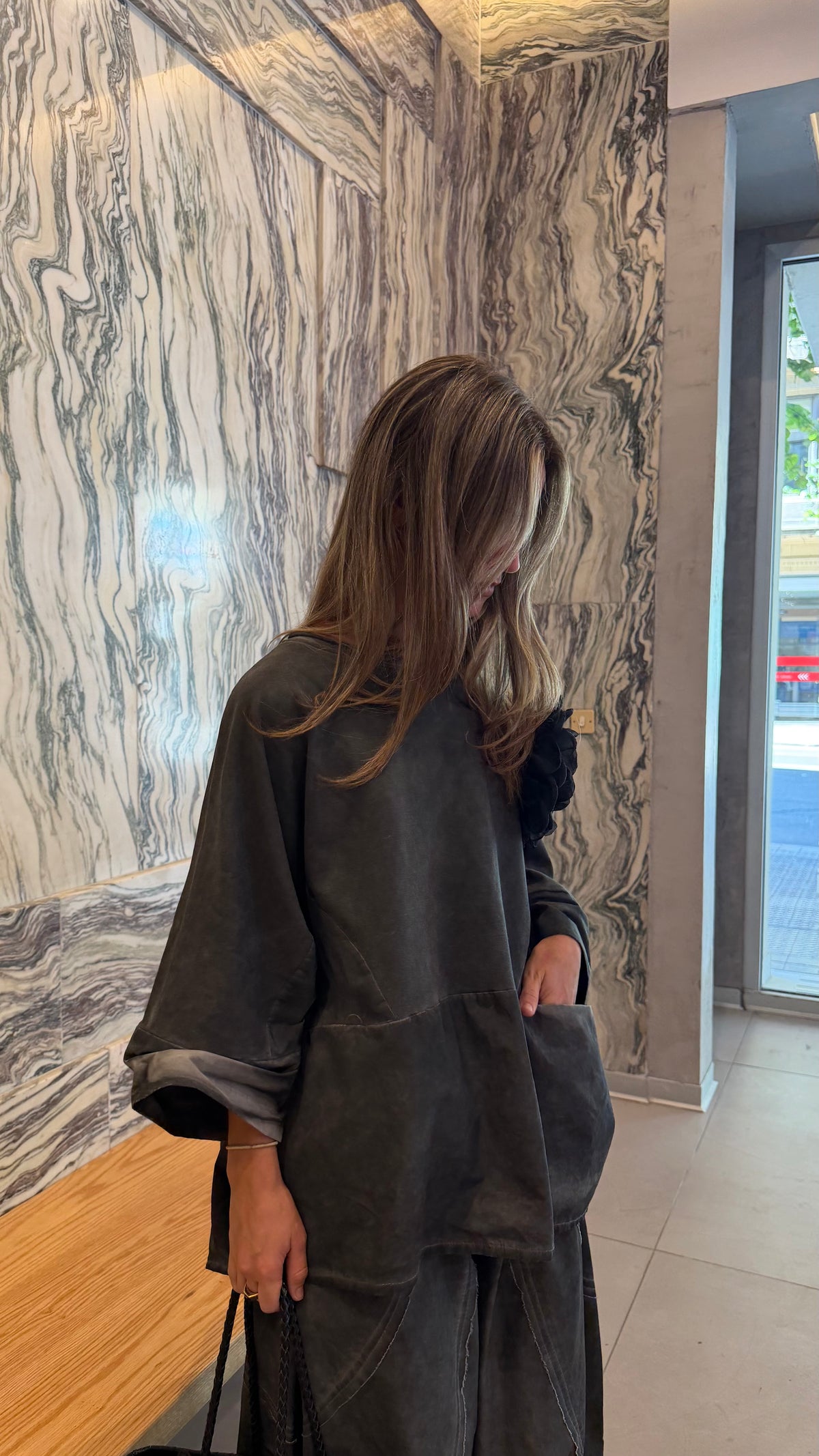 Blusa oversize con bolsillos